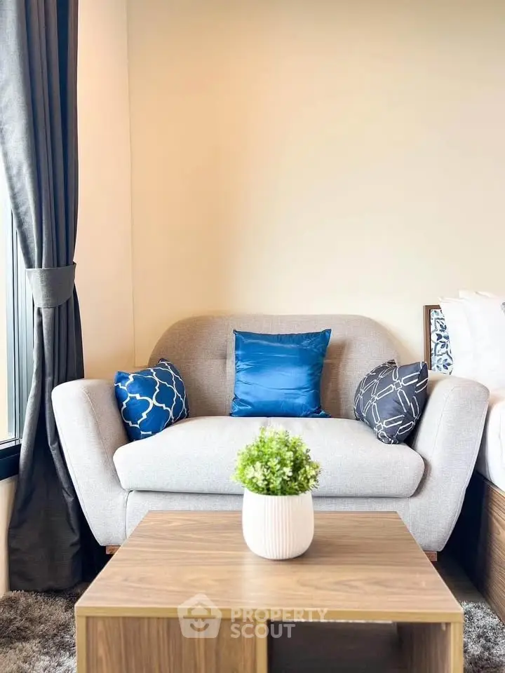 Cozy living room corner with stylish sofa and decorative pillows