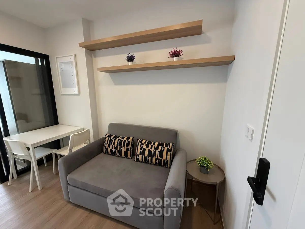 Cozy living room with modern sofa and stylish shelves in a chic apartment
