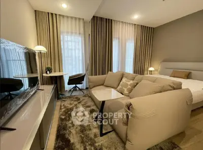 Modern living room with cozy sofa and stylish decor