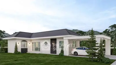 Charming single-story home with modern design and attached carport in lush green setting.