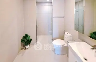 Spacious modern bathroom with sleek fixtures and elegant design