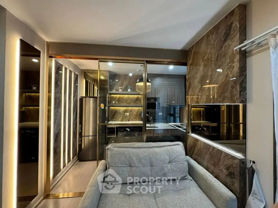 Luxurious modern living room with elegant marble accents and ambient lighting