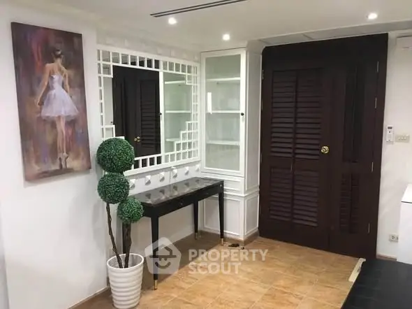 Chic interior hallway with elegant decor and stylish artwork, perfect for modern living.
