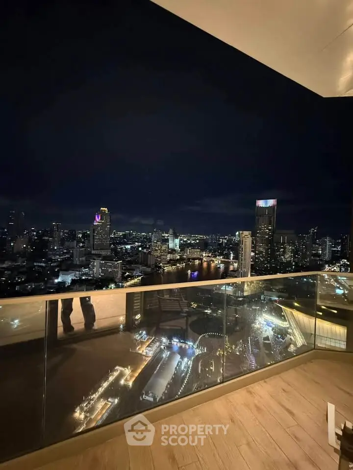 Stunning city skyline view from a modern balcony at night