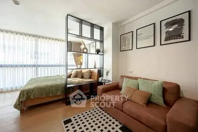 Stylish studio apartment with modern decor and cozy living area