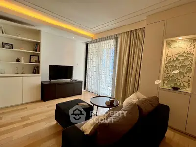 Elegant living room with modern decor and natural light