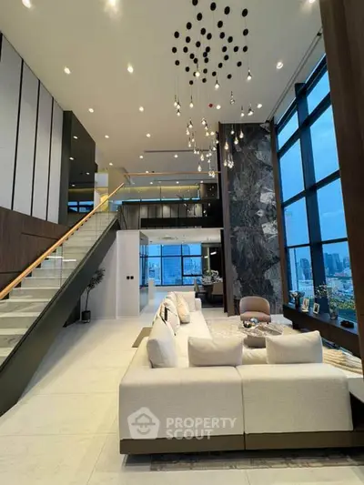 Luxurious modern living room with high ceilings and stunning city view