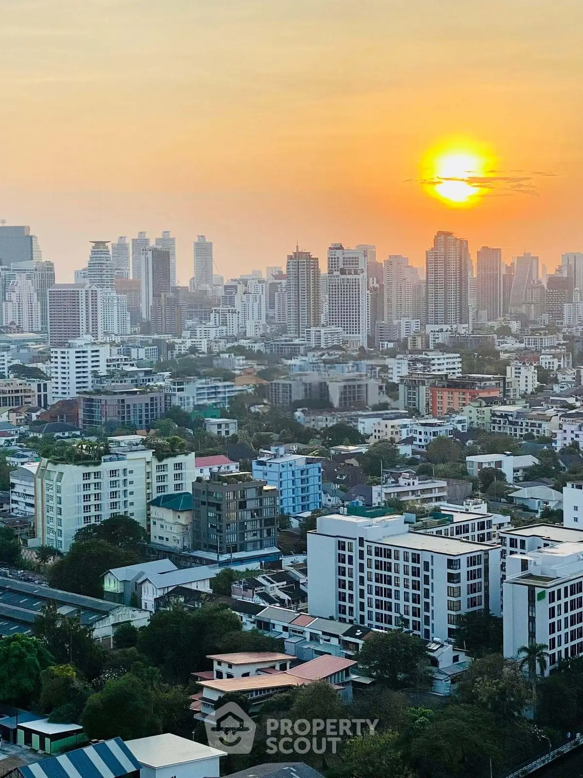 Stunning cityscape view at sunset showcasing urban skyline and vibrant architecture.