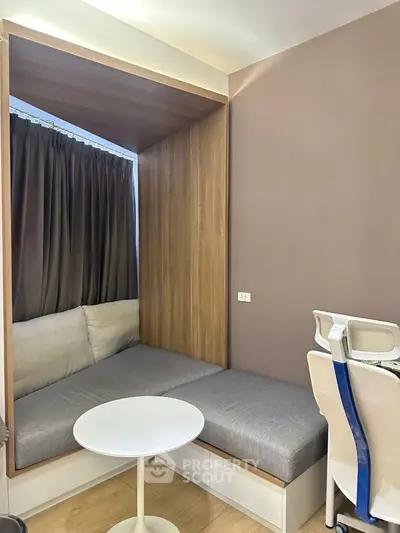 Modern study nook with built-in seating and stylish chair