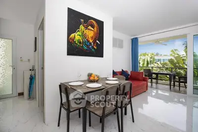 Modern living room with dining area and balcony view in a stylish apartment.