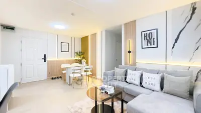 Modern living room with stylish decor and cozy seating area