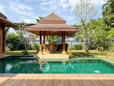 Luxurious villa with private pool and lush garden, perfect for relaxation and entertaining.