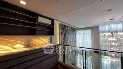Luxurious modern interior with elegant lighting and stylish shelving, perfect for sophisticated living.