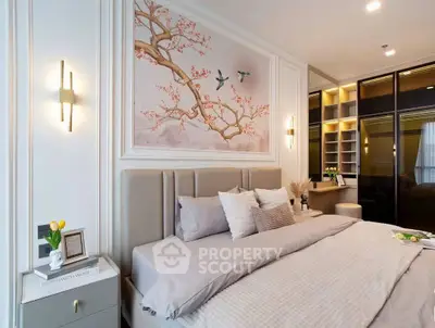 Luxurious bedroom with elegant decor and spacious layout, featuring a stylish headboard and modern lighting.