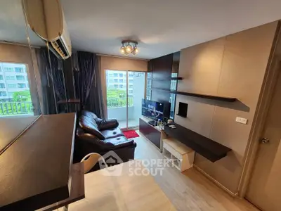 Modern living room with balcony view and sleek furniture design