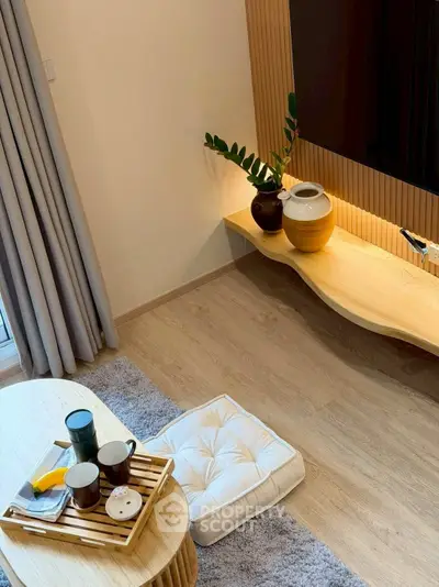 Cozy living room with modern decor and wooden accents