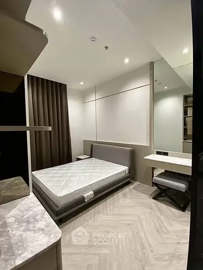 Modern minimalist bedroom with sleek design and cozy ambiance