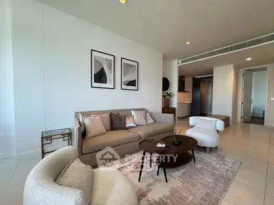 Modern living room with stylish furniture and elegant decor in a spacious apartment.