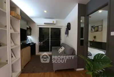 Modern living room with cozy sofa and balcony view in stylish apartment