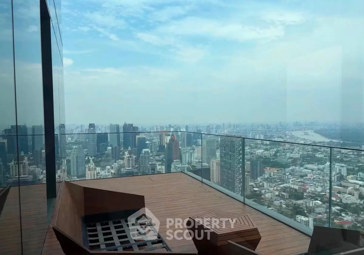 Stunning rooftop view from a modern high-rise building overlooking the city skyline.