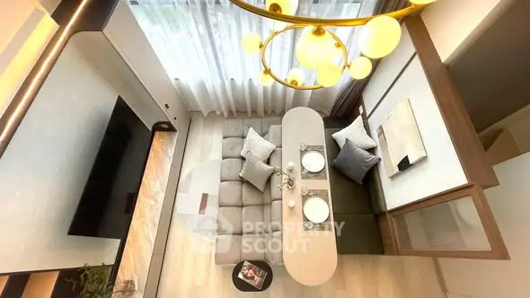 Modern living room with stylish decor and elegant lighting