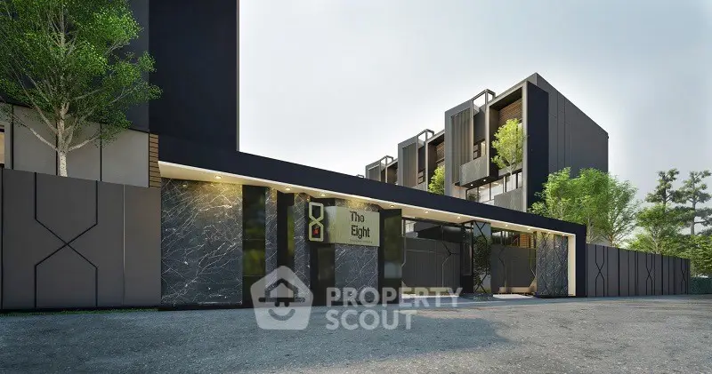 Modern luxury apartment building with sleek design and lush greenery.