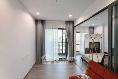 Modern apartment interior with balcony view and stylish furnishings