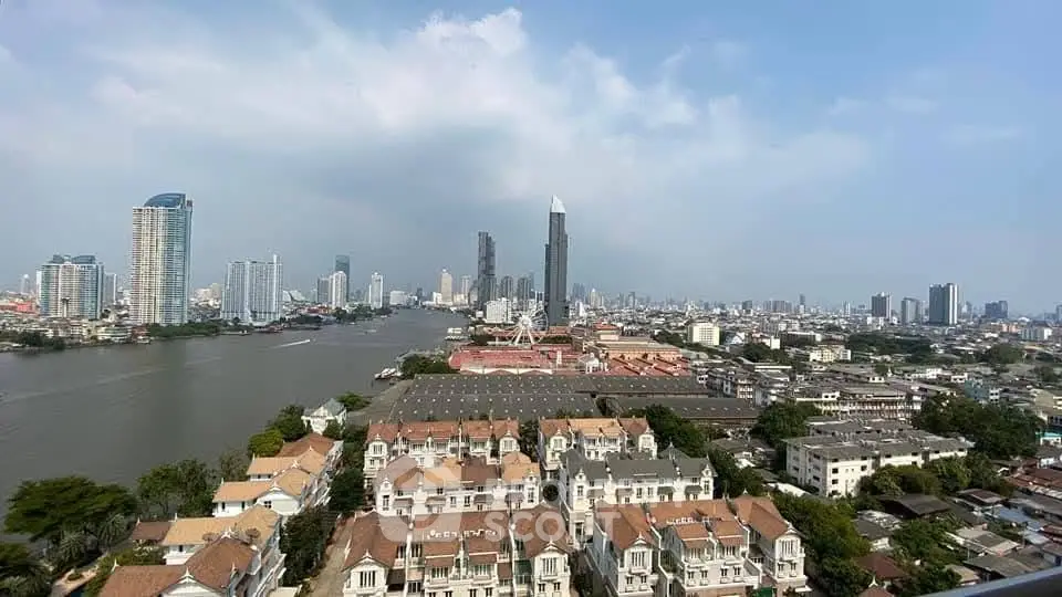 Stunning cityscape view with river and modern skyscrapers, showcasing prime real estate location.
