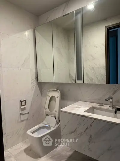 Luxurious marble bathroom with modern fixtures and sleek design