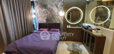 Luxurious bedroom with modern decor, featuring elegant lighting and stylish furnishings.