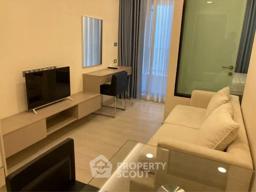 Modern living room with sleek furniture and natural light