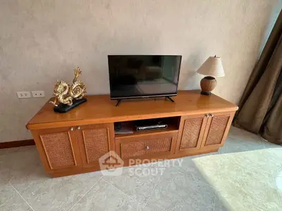 Stylish living room with elegant wooden TV stand and modern decor