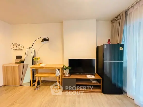 Modern living room with stylish furniture and sleek appliances