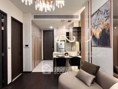Luxurious modern living room with elegant decor and open kitchen layout.