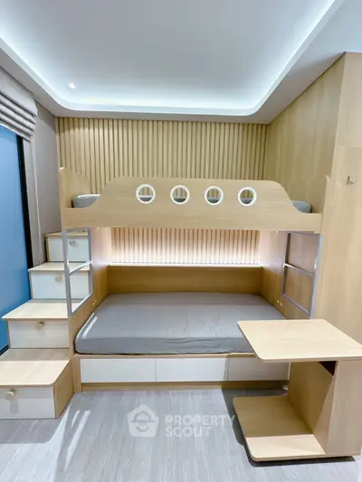 Modern bedroom with stylish bunk bed and wooden accents