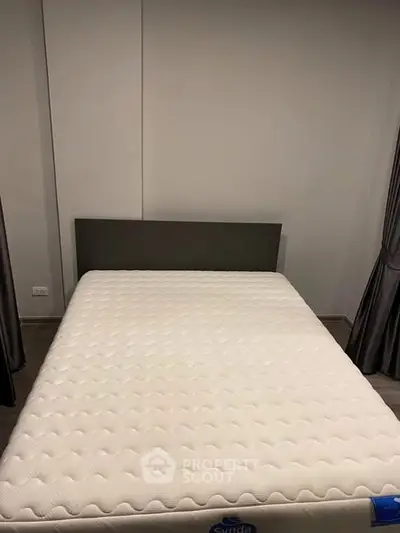 Modern bedroom with minimalist design and comfortable mattress