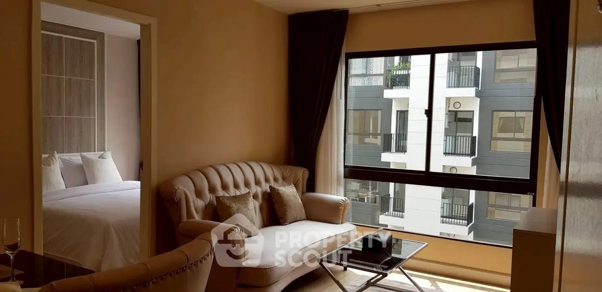 Cozy living room with elegant sofa and large window view in modern apartment