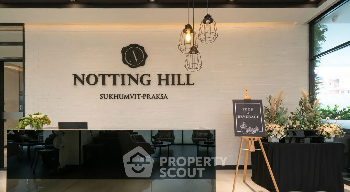 Elegant Notting Hill Sukhumvit-Praksa lobby with modern decor and welcoming ambiance.