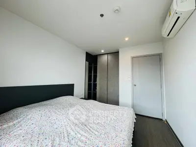 Modern bedroom with sleek design and air conditioning