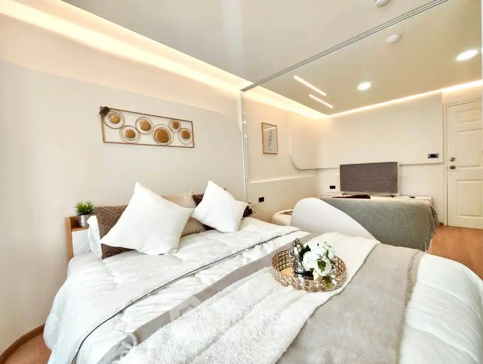 Luxurious bedroom with modern decor and cozy ambiance