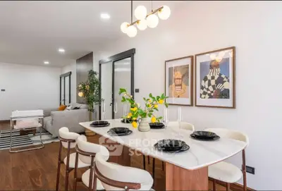 Stylish modern dining area with elegant decor and open layout, perfect for entertaining.