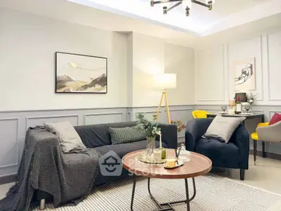 Stylish modern living room with cozy seating and elegant decor