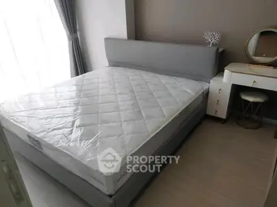 Modern bedroom with stylish furniture and natural light