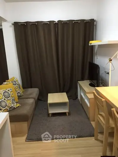 Cozy living room with modern furniture and stylish decor, perfect for relaxation and entertainment.