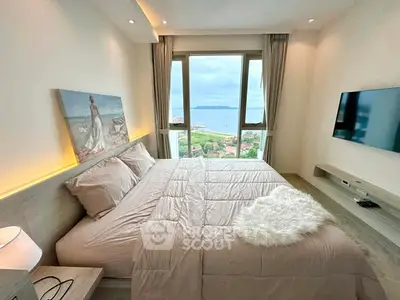 Luxurious bedroom with stunning ocean view and modern decor