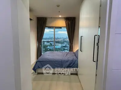 Modern bedroom with stunning city view and elegant decor