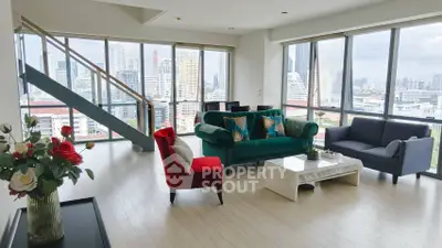 Spacious modern living room with city view and stylish furniture