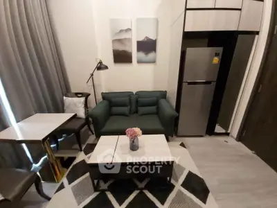 Modern living room with stylish furniture and decor, featuring a cozy sofa and elegant dining area.