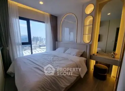 Luxurious bedroom with stunning city view and elegant decor