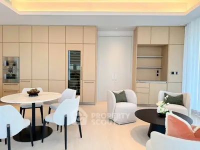 Luxurious modern living room with elegant furniture and open kitchen layout